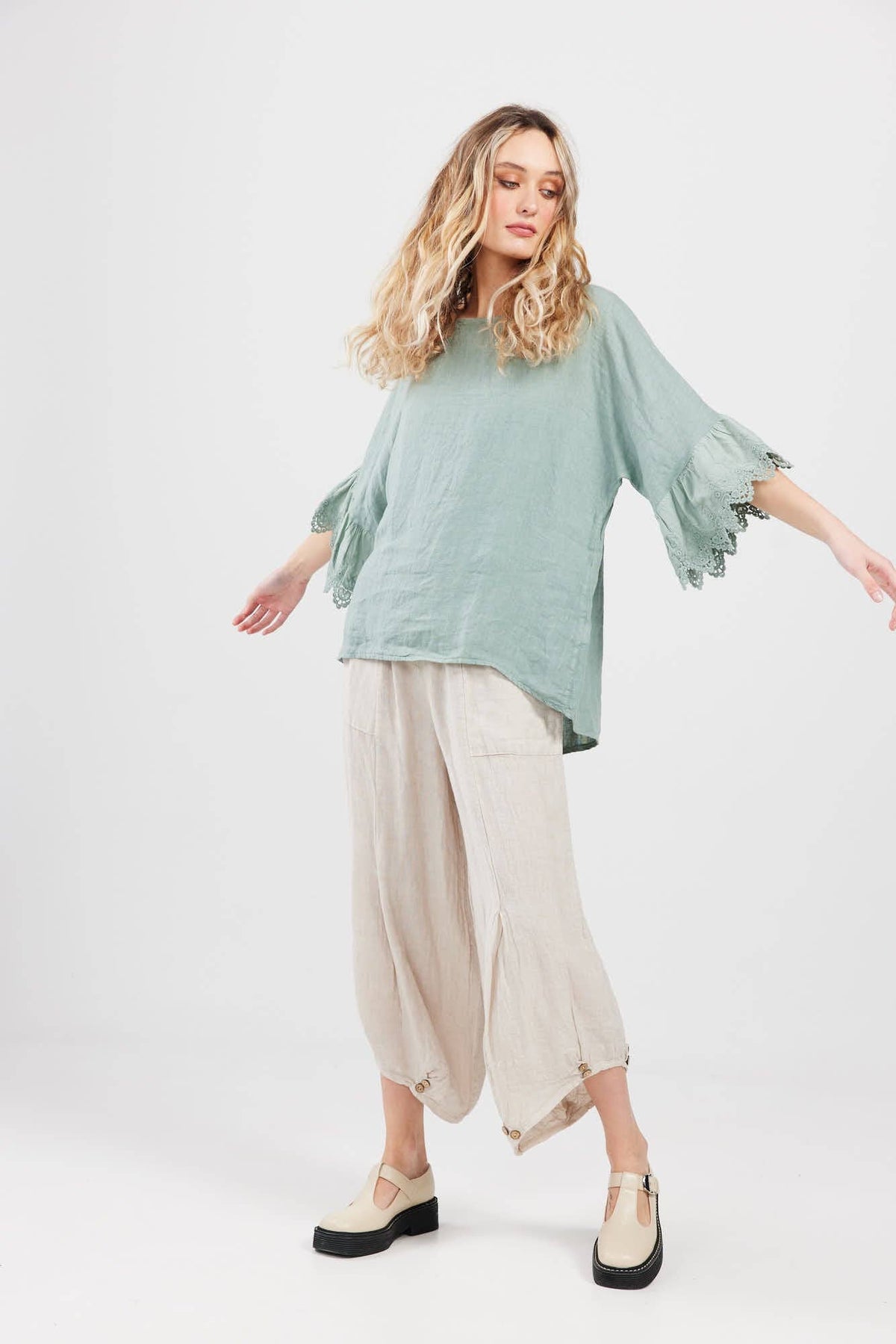 Ellie lace ruffled sleeve top. Pastel Sage green