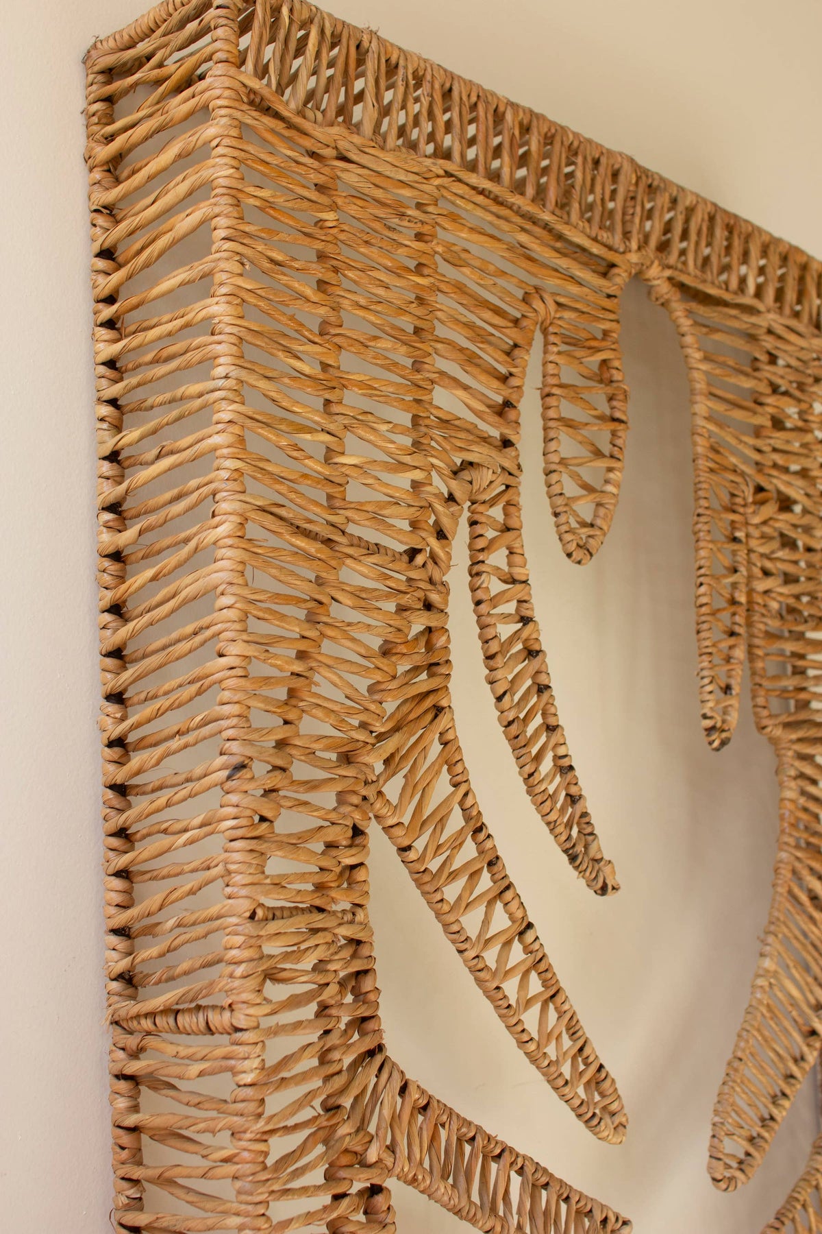 WOVEN SEAGRASS AND IRON LEAF WALL PANEL